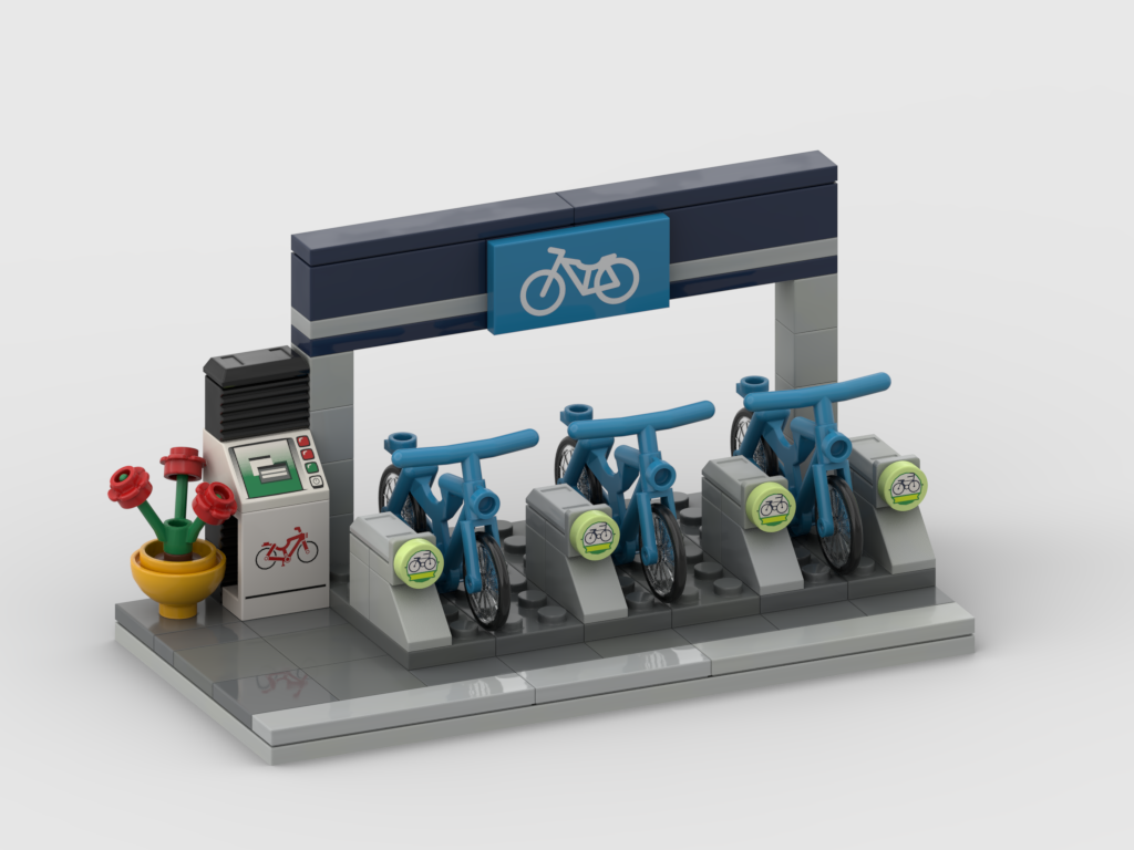 Bike Rental Station MOC with three blue bicycles, docking stands, kiosk, sign, and flower pot